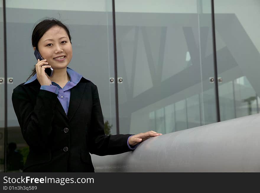 Asian Businesswoman On Cell Phne