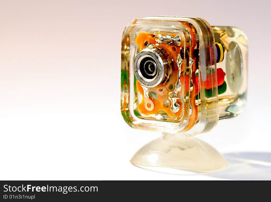 A close up photo of a small electronic device that allows off camera flash to be fired with the main flash. A close up photo of a small electronic device that allows off camera flash to be fired with the main flash