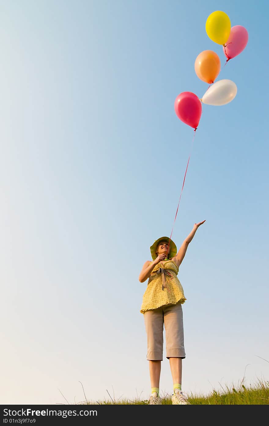 Girl with balloons