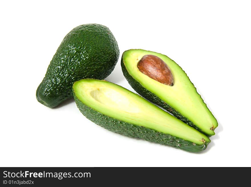 Fresh avocados isolated on white background