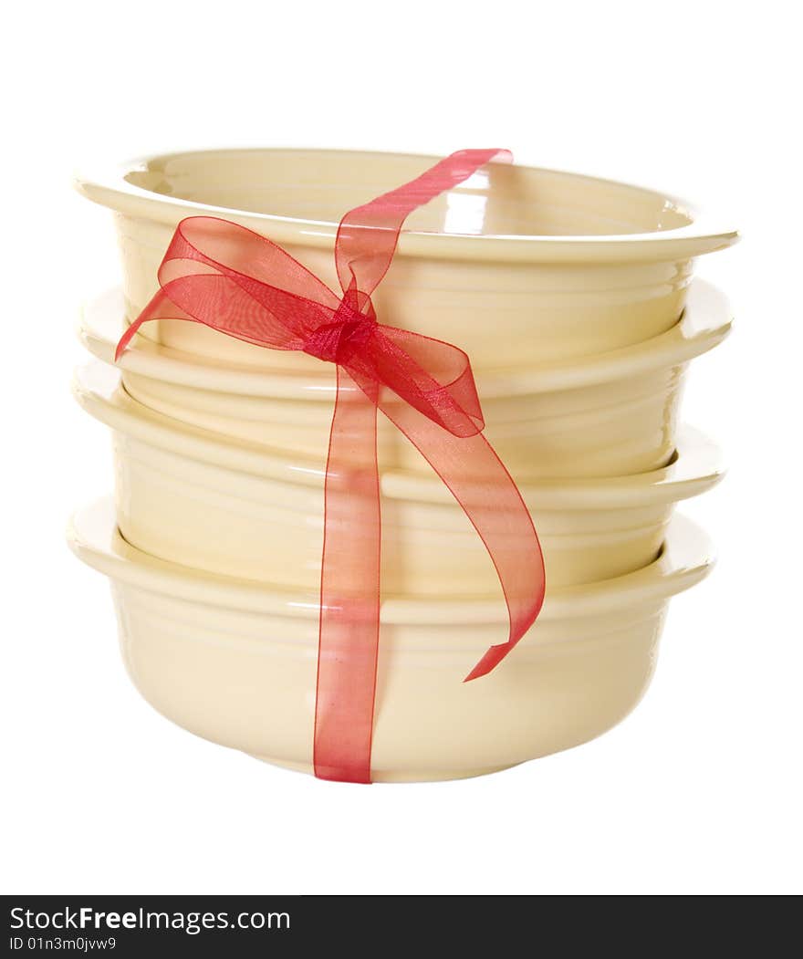 Yellow Ceramic Bowls With Red Bow Isolated