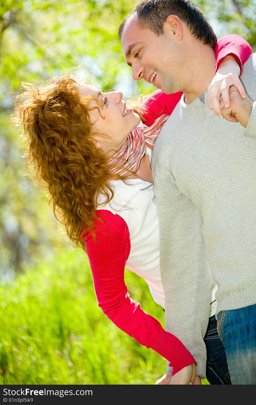 Happy young couple with outdoor portrait. Happy young couple with outdoor portrait