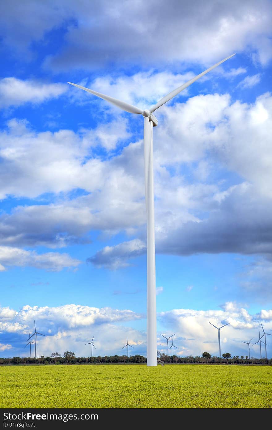 Windmills against a cloudy sky