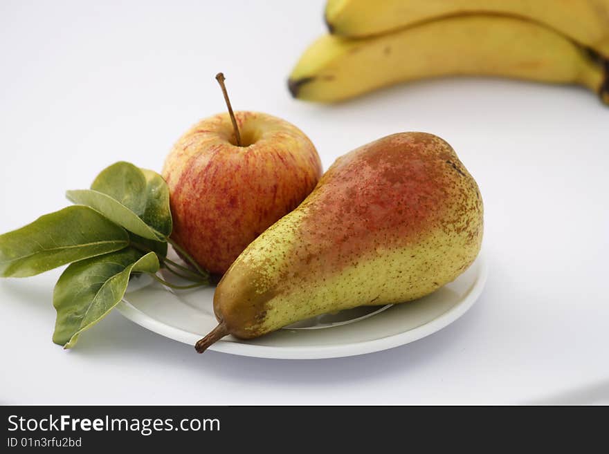 Apple and Pear on a dish