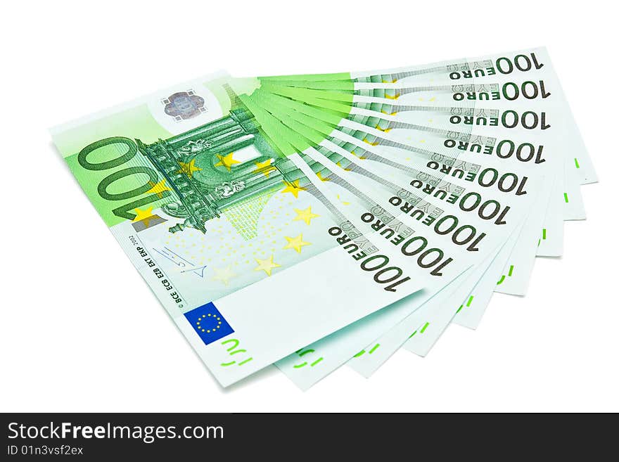 Several one hundred euro bank notes isolated on white