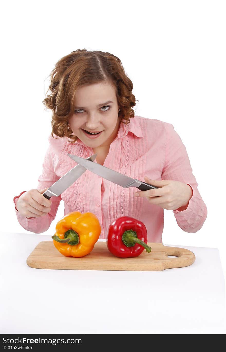 Woman wants to eat sweet peppers. Beautiful young girl with fresh vegetables.  Woman with sweet peppers. Isolated over white background. Woman wants to eat sweet peppers. Beautiful young girl with fresh vegetables.  Woman with sweet peppers. Isolated over white background.