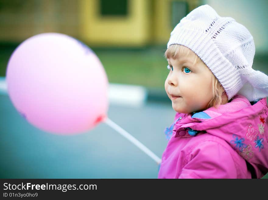 Girl 3 years old with an air ball for a walk. Girl 3 years old with an air ball for a walk