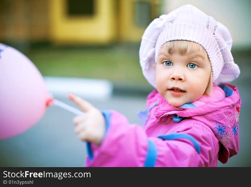 Girl 3 years old with an air ball for a walk. Girl 3 years old with an air ball for a walk