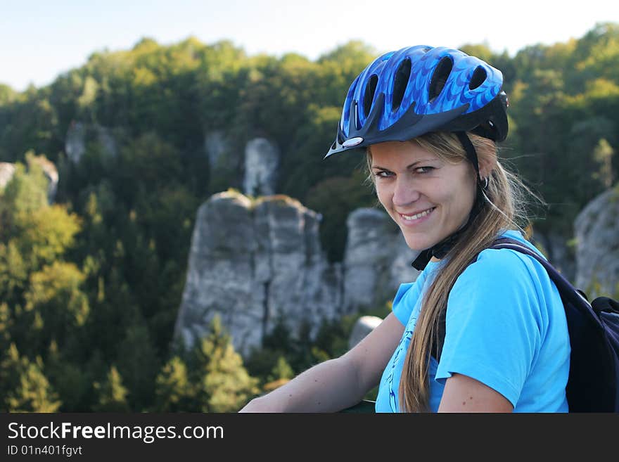 Smiling girl with a bicycle helmet