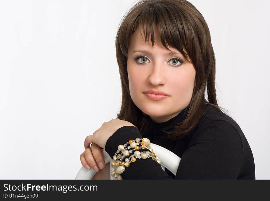 Young beautiful woman sit on chair