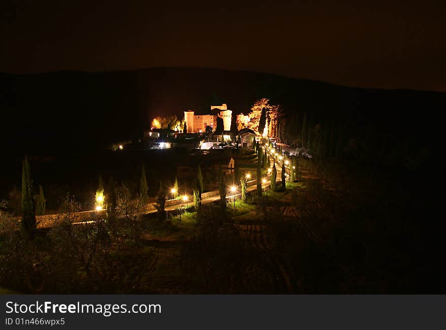 This is the Castello di Meleto in Italy / Tuscany with red wine. This is the Castello di Meleto in Italy / Tuscany with red wine