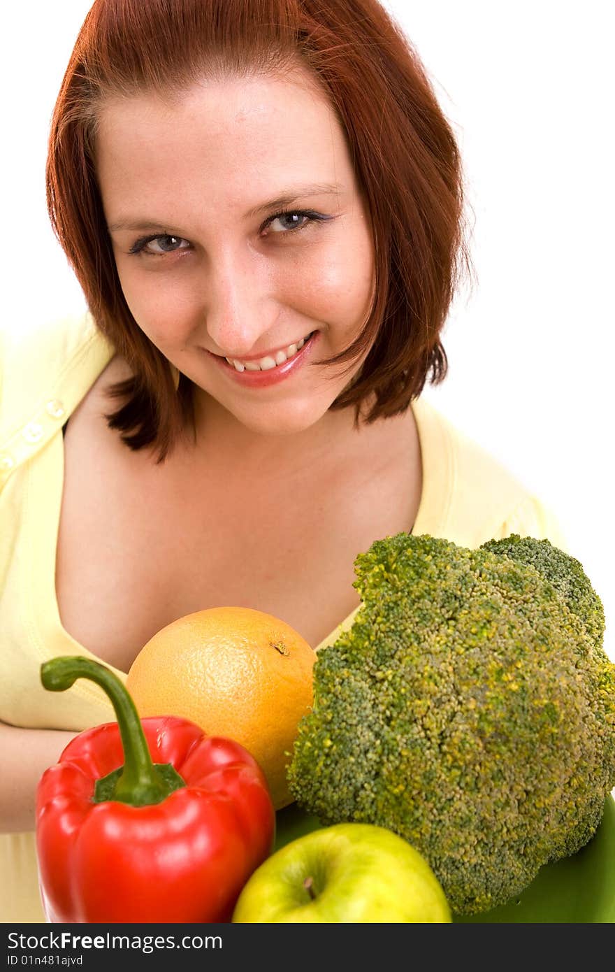 Woman eating vegetables