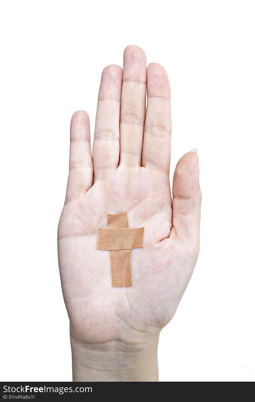 Female hand with plaster cross on white background