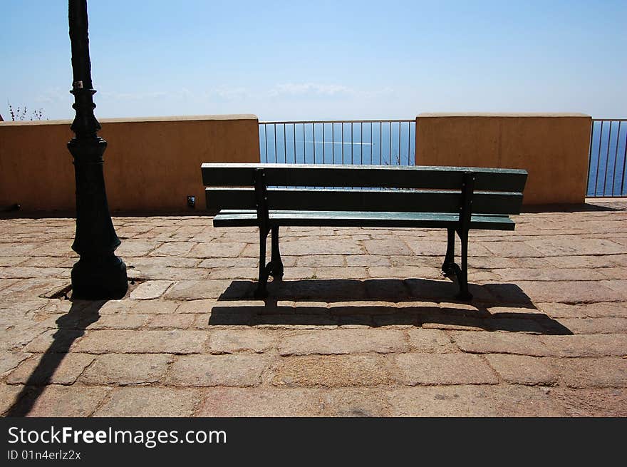 Panoramic viewspot at Bonifacio with a bench and a lightpost. Panoramic viewspot at Bonifacio with a bench and a lightpost