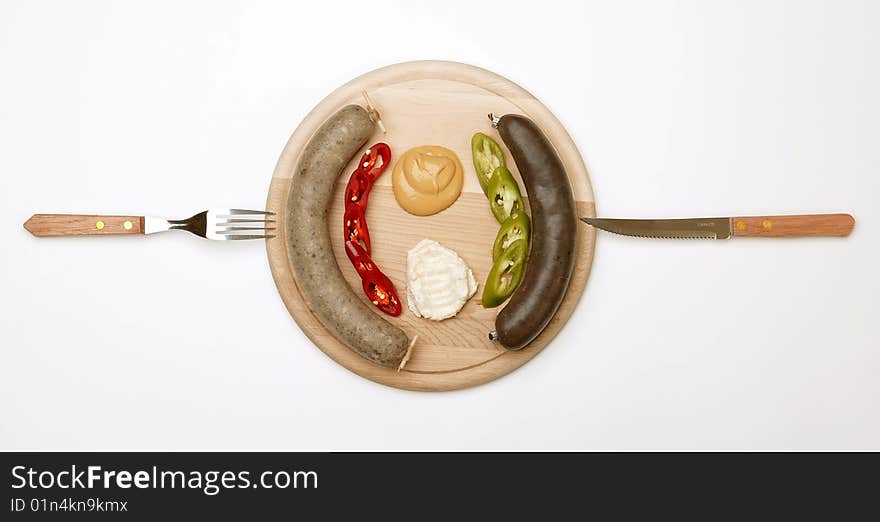 A Wooden Plate Full Of Sausage 2