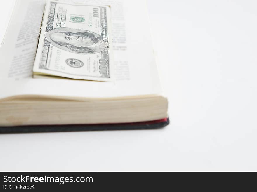 One Hundred dollar bills hiding in prop book. One Hundred dollar bills hiding in prop book