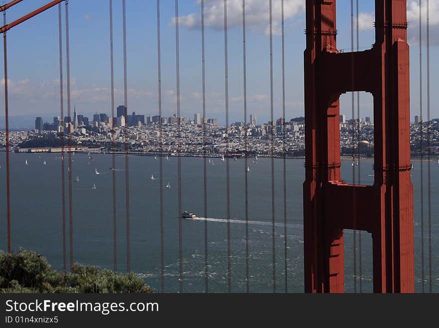 USA, San Francisco- Golden Gate Bridge CU with view of City. USA, San Francisco- Golden Gate Bridge CU with view of City