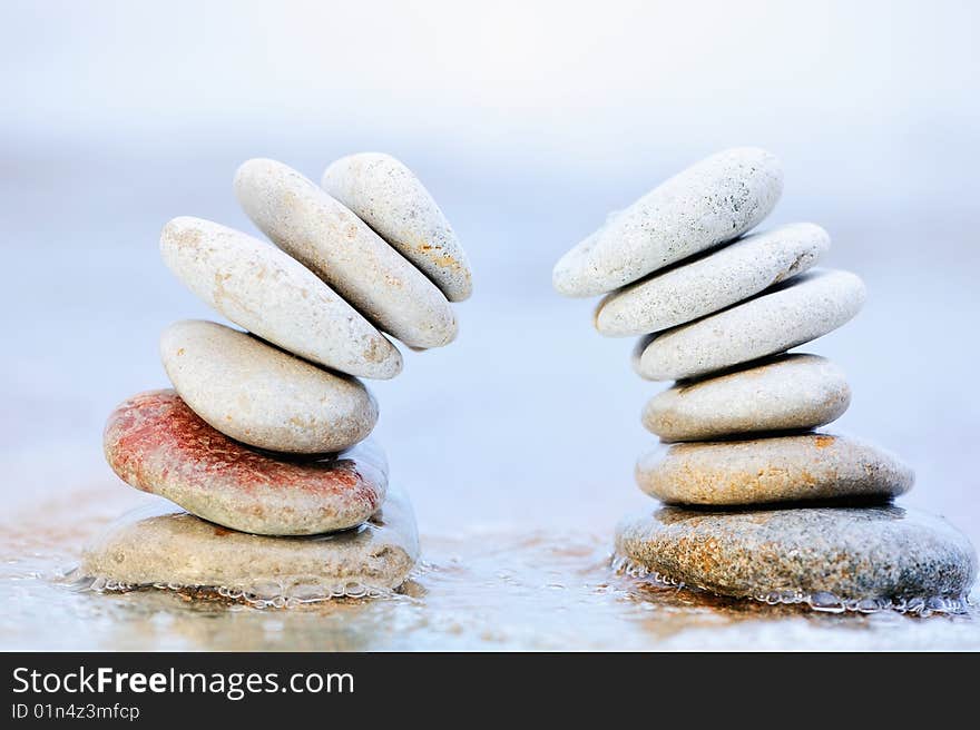 Construction of two towers of white stone on the coast. Construction of two towers of white stone on the coast