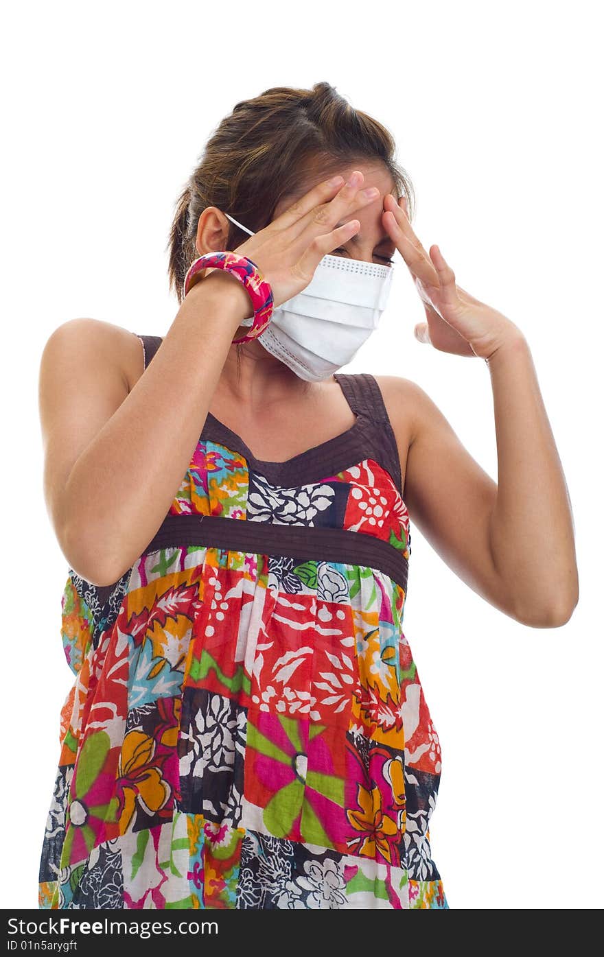 Protective mask on young asian woman, isolated on white