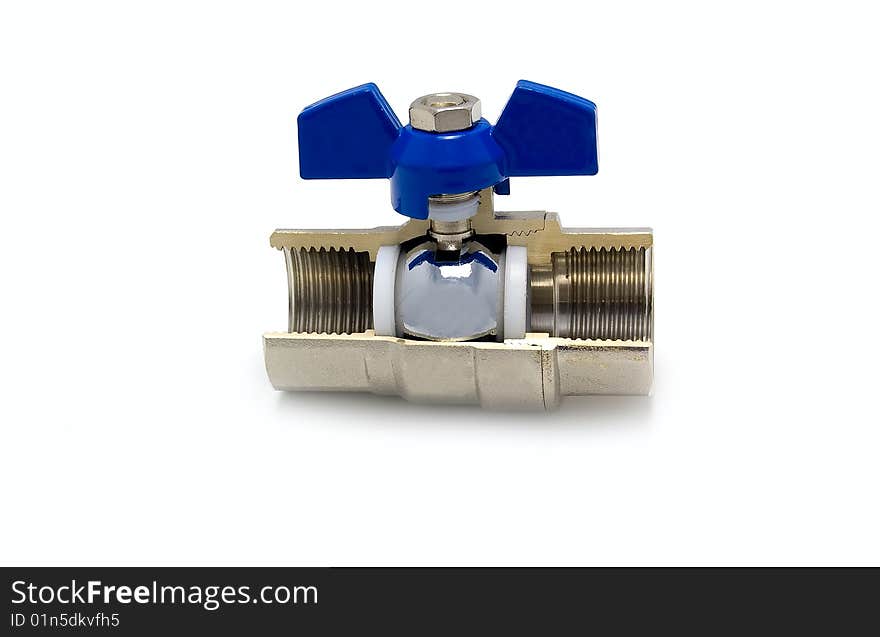 The water valve with the dark blue handle in a cut. White background. The water valve with the dark blue handle in a cut. White background.