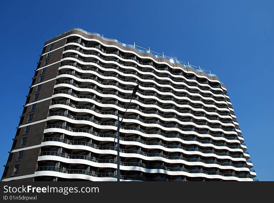 Modern Apartment Building over blue sky