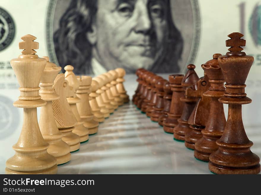 Chess composition on dollar background