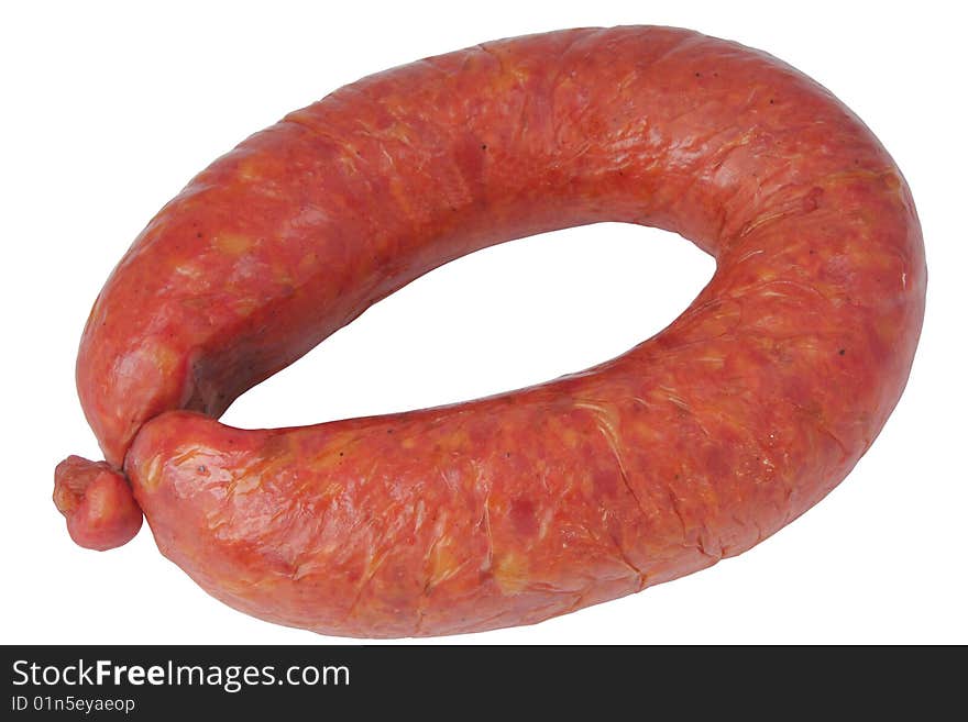 Circle of smoked meat sausage on a white background. Circle of smoked meat sausage on a white background