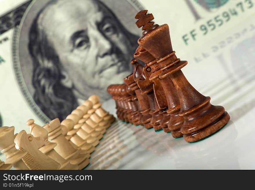 Chess composition on dollar background