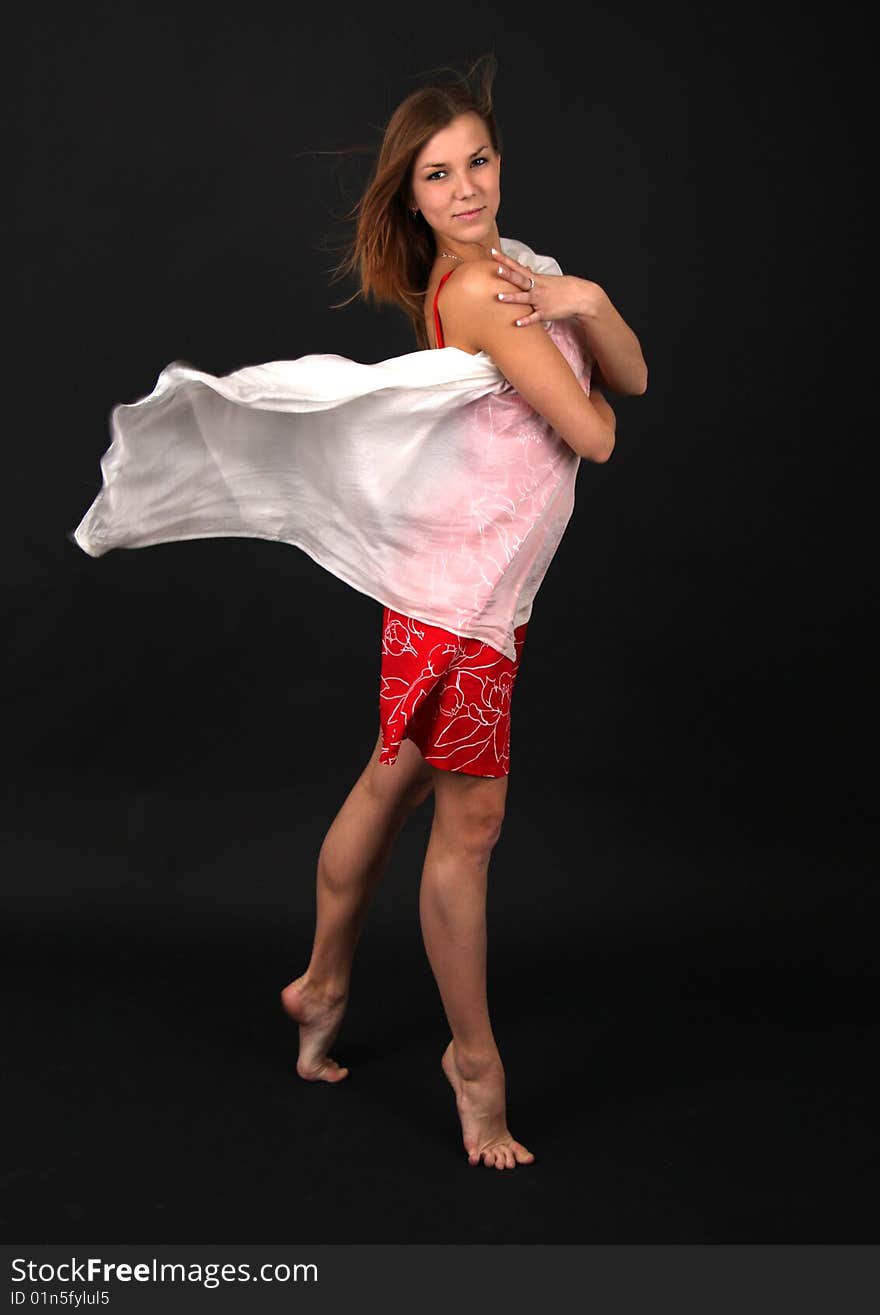 Elegant young woman with a big scarf