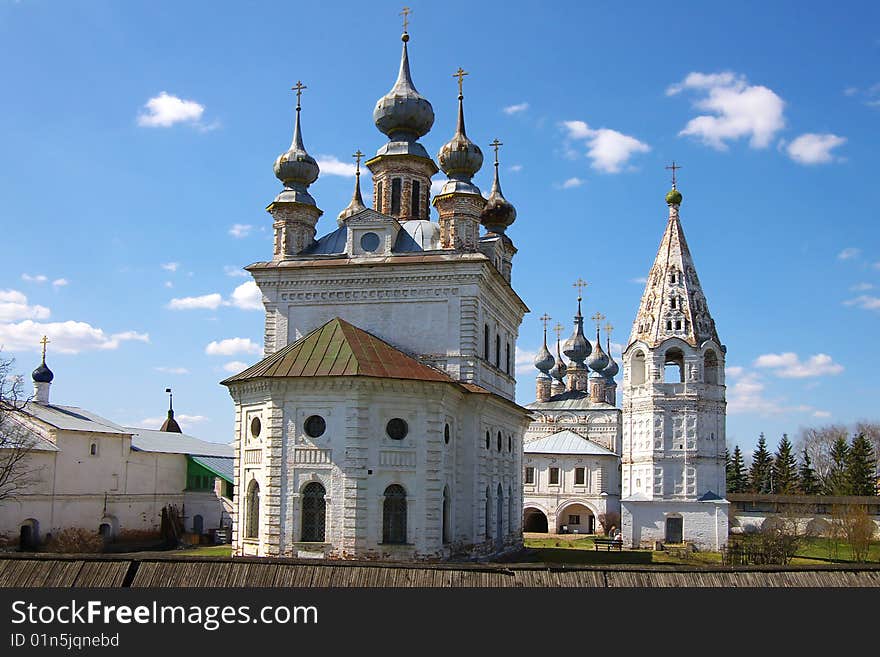 Church on a background of the blue sky with a cloud. Russia, Yur'ev-Polskiy