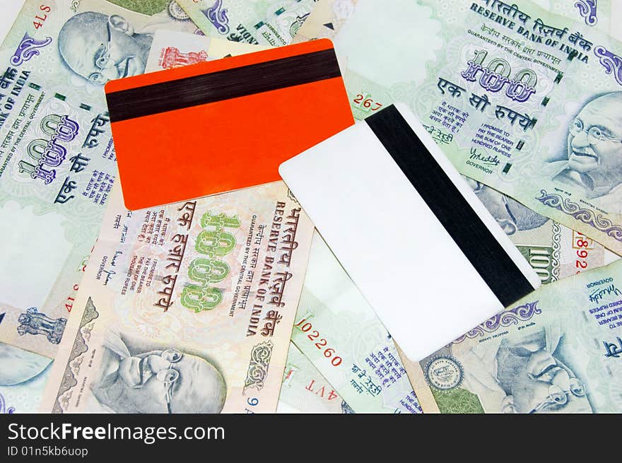 Top view of indian rupees With credit card and david card. Top view of indian rupees With credit card and david card