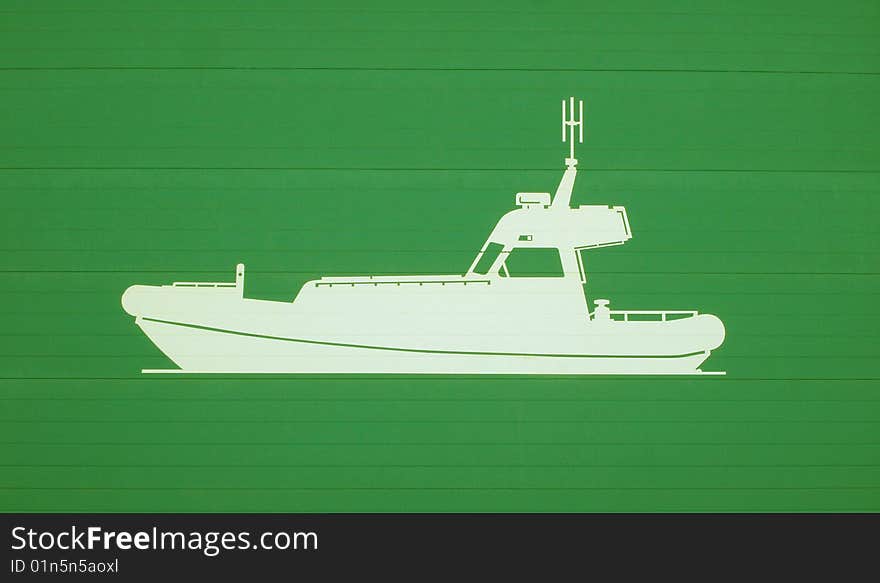 white life boat on a green baclground