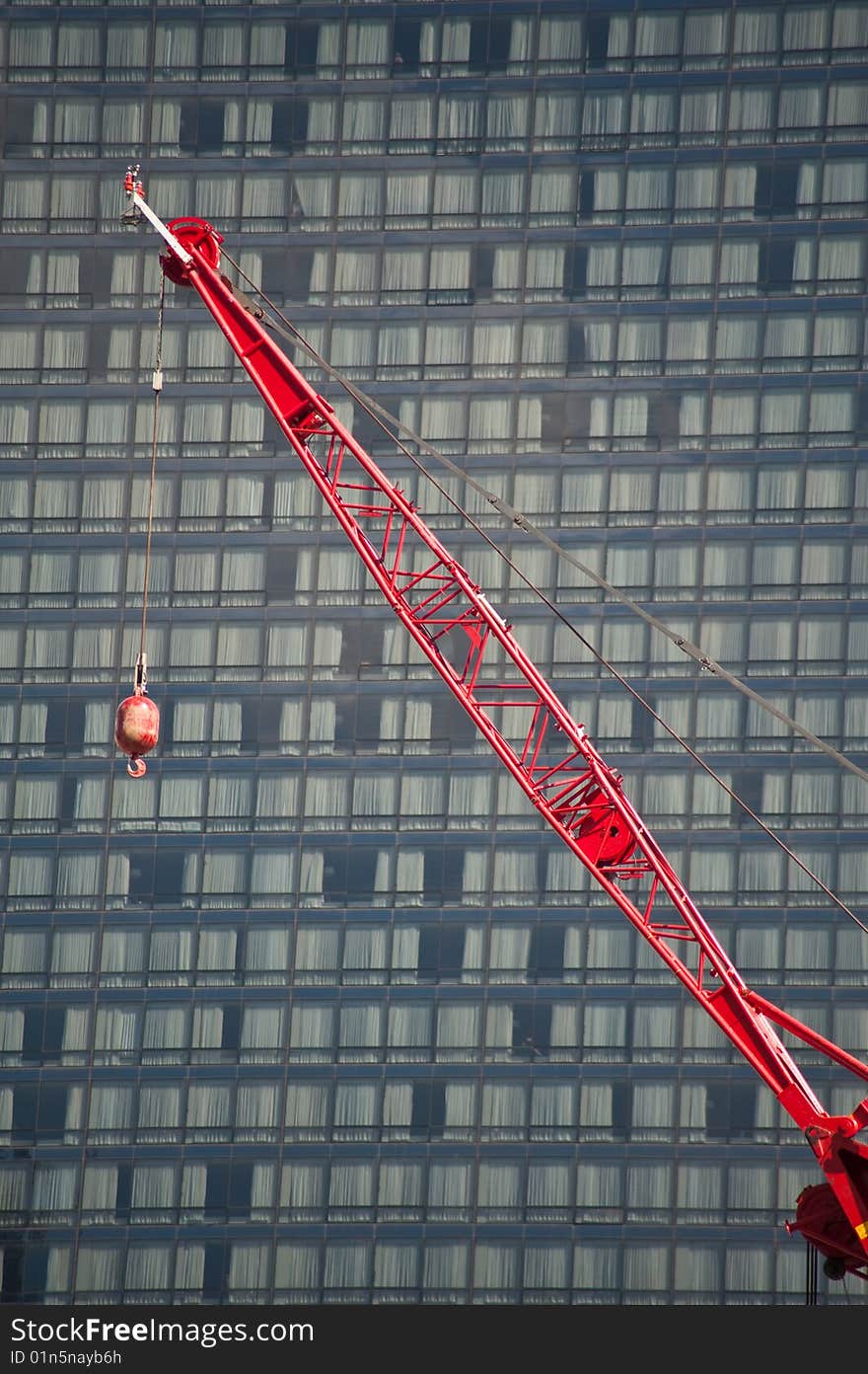 Construction cranes at work putting up high rise buildings. Construction cranes at work putting up high rise buildings.