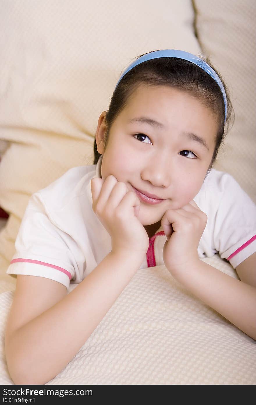 A chinese girl is thinking about something