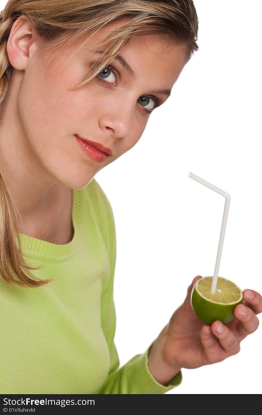 Woman holding lime with straw on white background. Woman holding lime with straw on white background