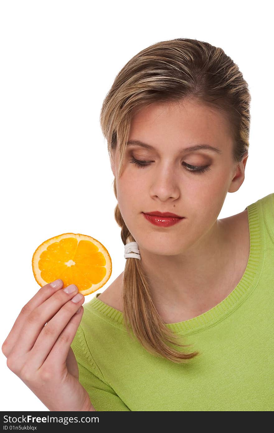 Woman holding slice of orange on white background. Woman holding slice of orange on white background