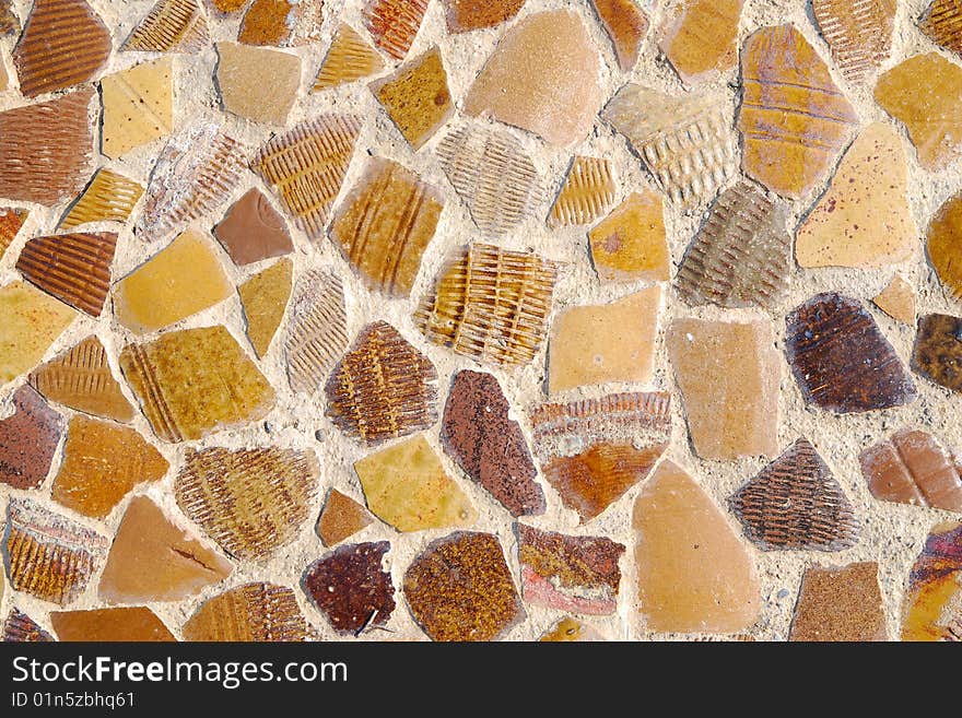 It\'s a beautidul wall  made by pottery chips. It\'s a beautidul wall  made by pottery chips