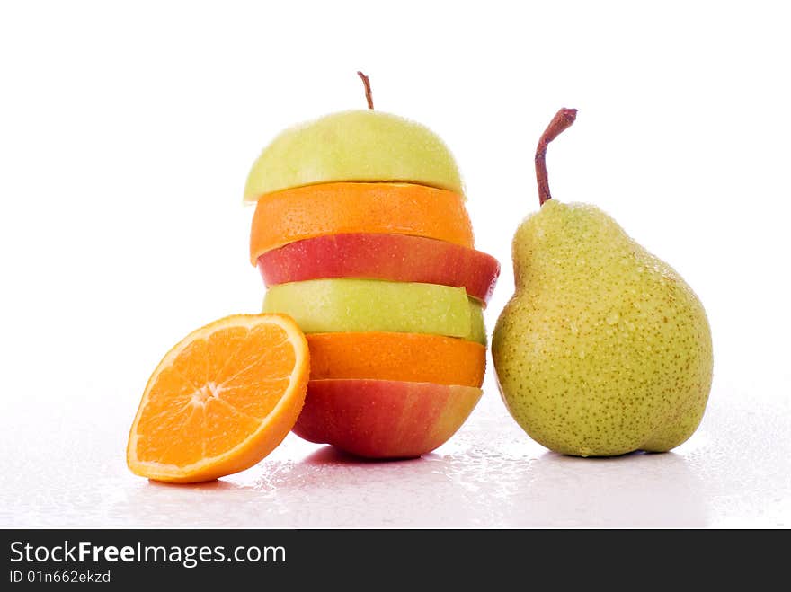 Cut fresh fruits, with drops of water