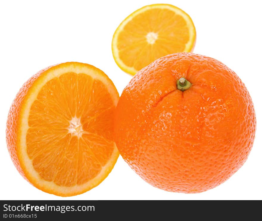 Fresh oranges. One cut on half. Isolated on white background. Fresh oranges. One cut on half. Isolated on white background.