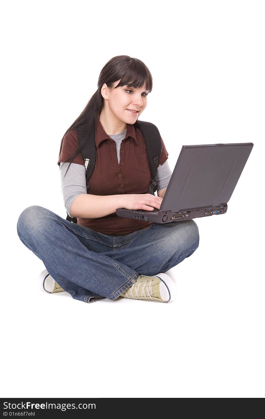 Casual female student with laptop. over white background