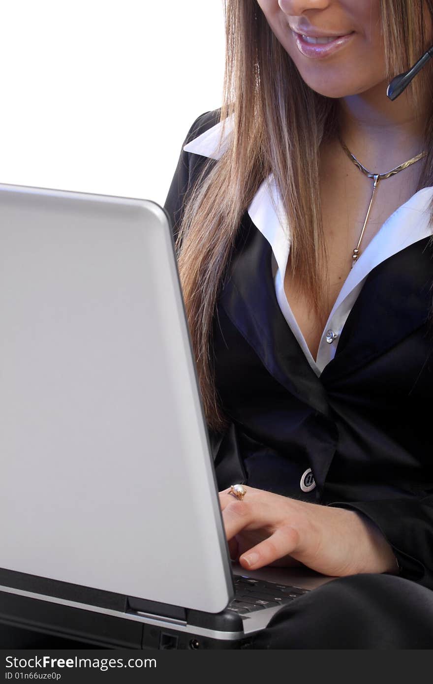 Young smiling lady with headphones and a laptop isolated on white background, partially exposed face. Young smiling lady with headphones and a laptop isolated on white background, partially exposed face.