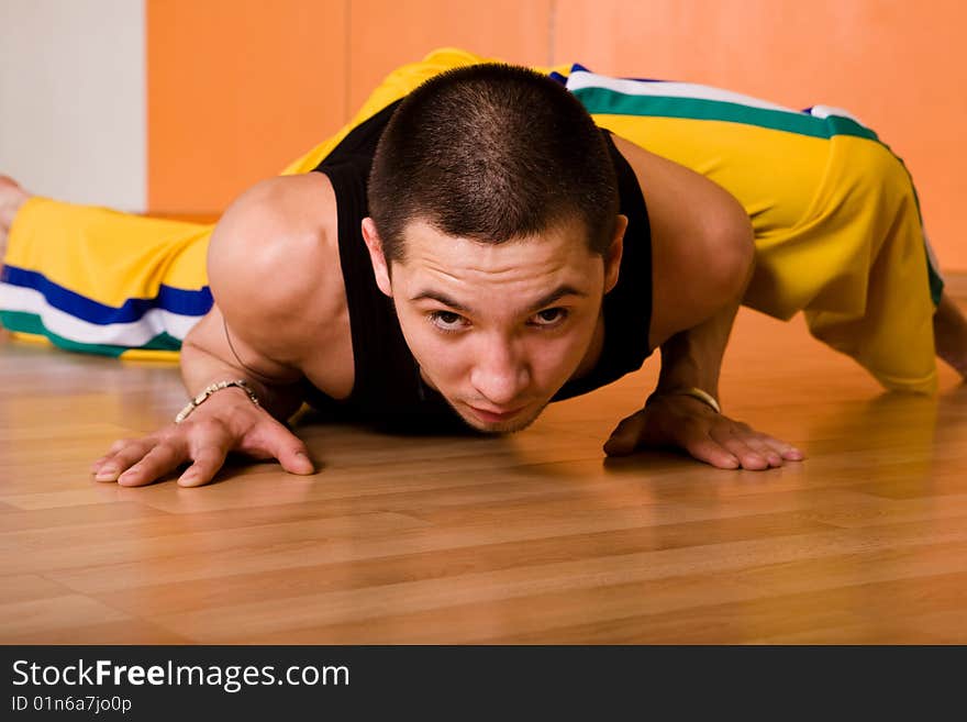 Muscular Dancer Posing In Hall