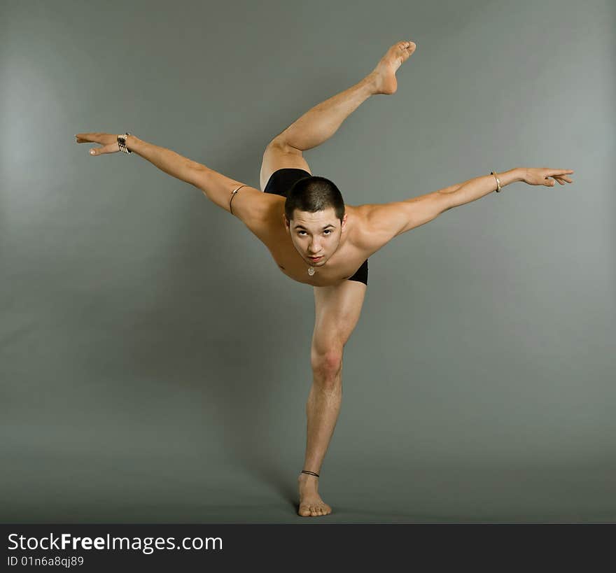 Young Dancer Over Gray Background