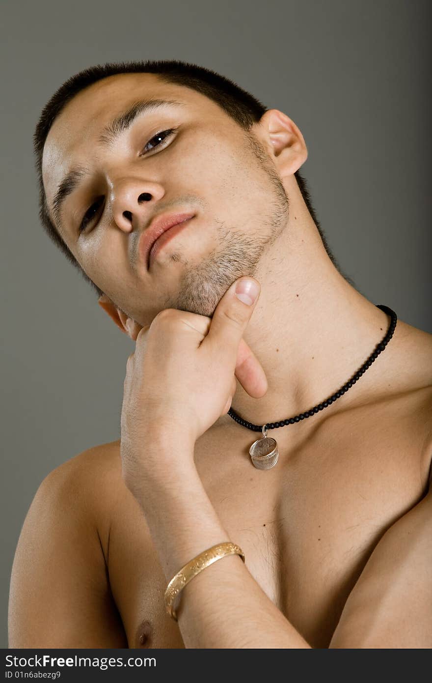 Young dancer over gray background