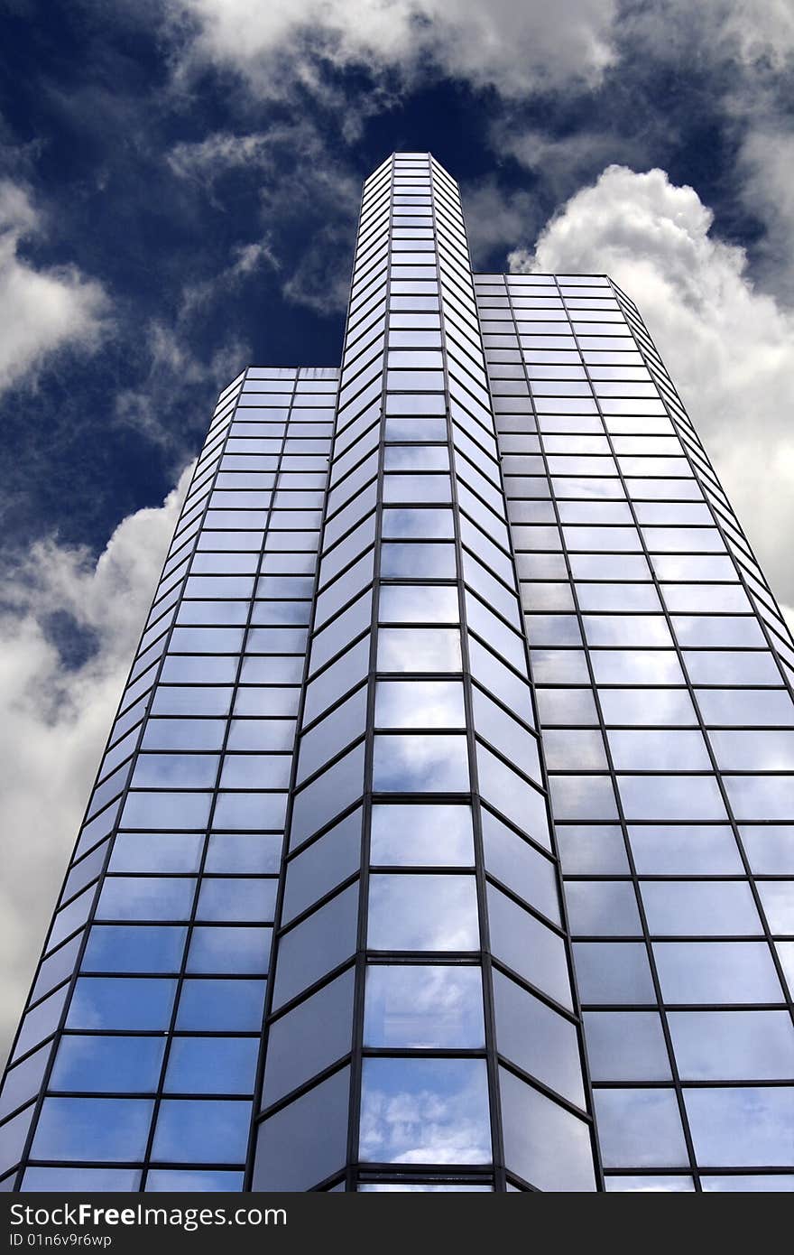 Office Building Skyscraper with Blue Sky Background