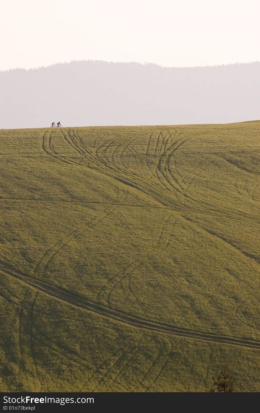 Two bikers far on horizont, north Slovakia. Two bikers far on horizont, north Slovakia