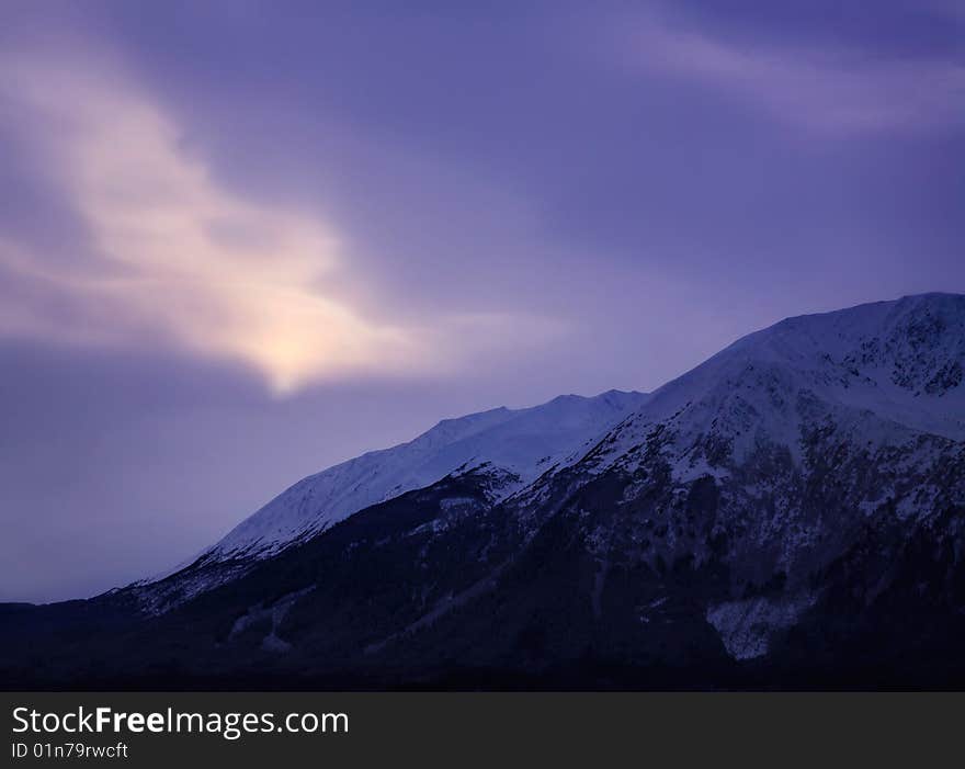 Thinly Veiled Sunlight Over The Frigid Landscape Of The Kenai Peninsula, Alaska