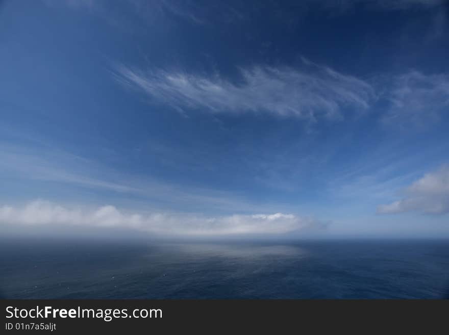 Clouds over ocean seascape