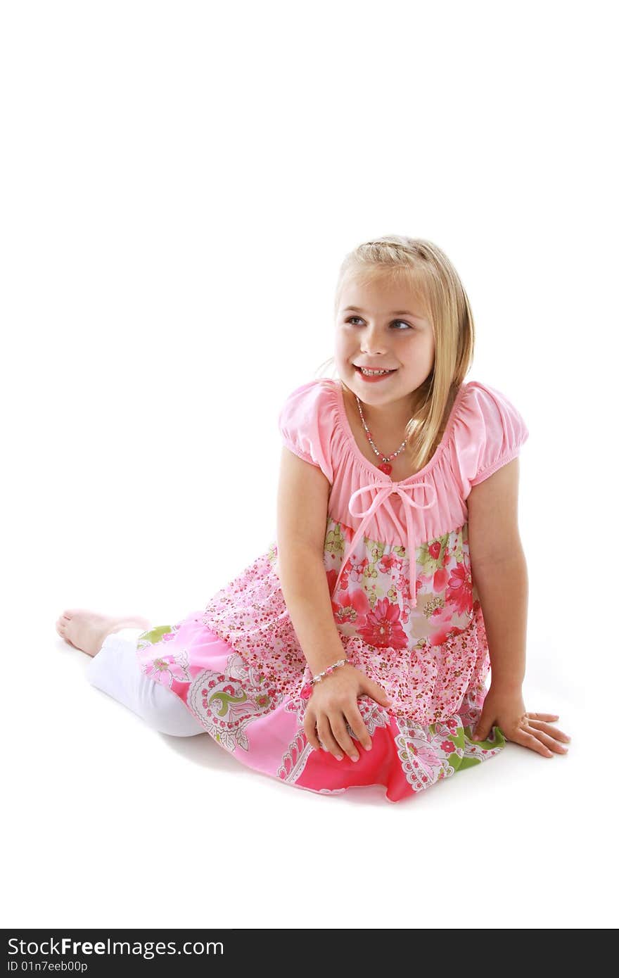 Cute little girl wearing a pink dress