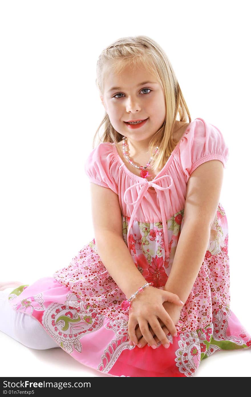 Cute little girl wearing a pink dress